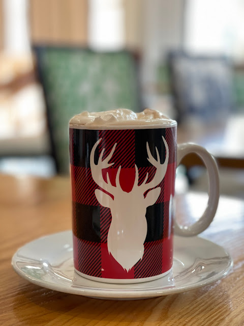 cute holiday hotel breakfast with moose mug
