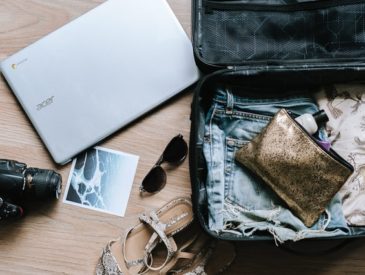 woman packing suicase